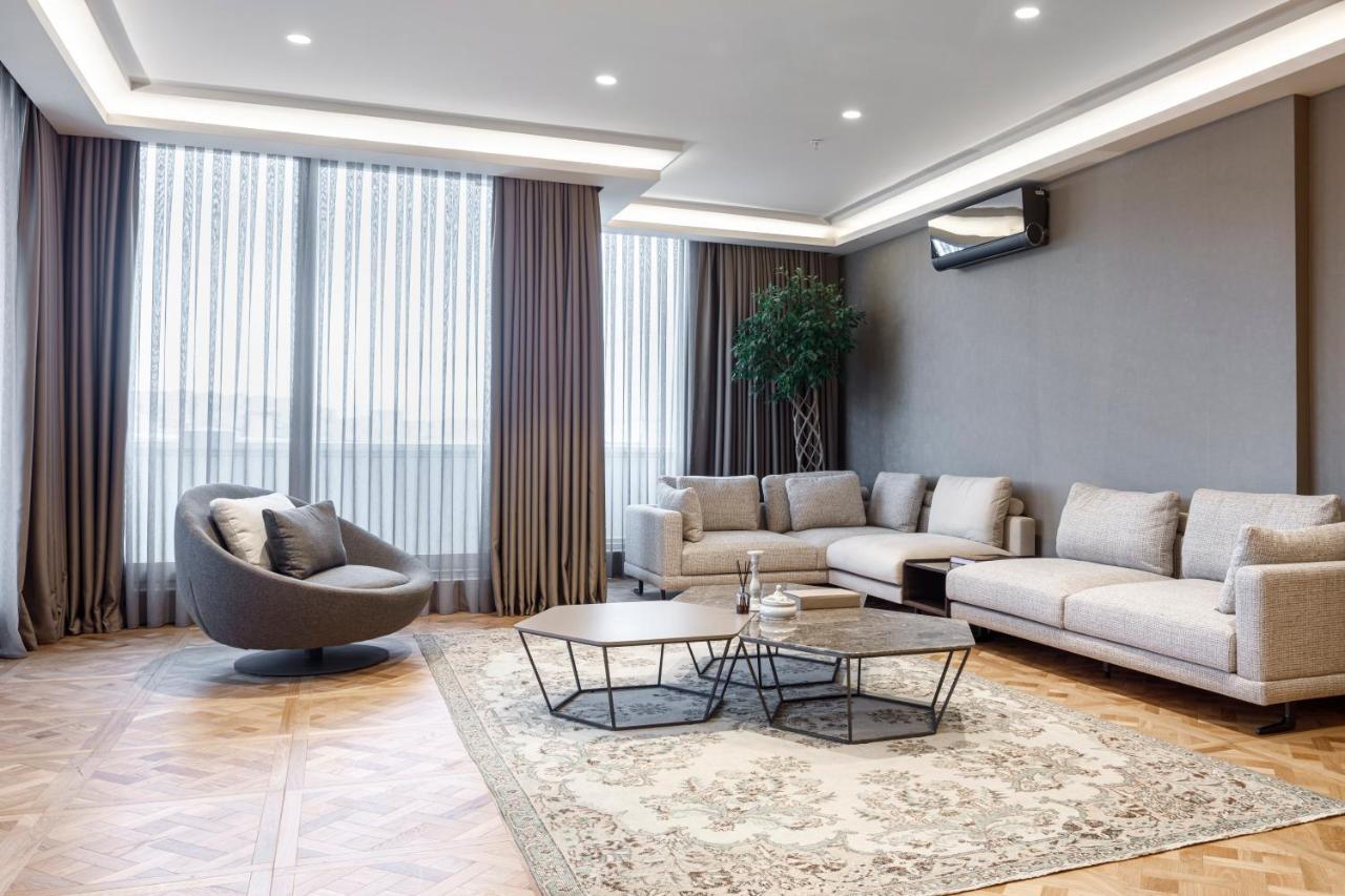 Lazzoni Hotel Istanbul Exterior foto A living room in a modern apartment